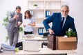 Two male and one female employees working in the office Royalty Free Stock Photo