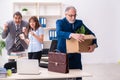 Two male and one female employees working in the office Royalty Free Stock Photo