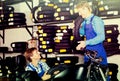 Two male professionals standing with new tires Royalty Free Stock Photo