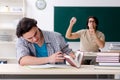 Two male students in the classroom Royalty Free Stock Photo