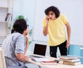Two male students in the classroom Royalty Free Stock Photo