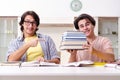 Two male students preparing for exams at home Royalty Free Stock Photo