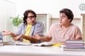 Two male students preparing for exams at home Royalty Free Stock Photo