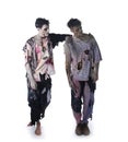 Two male zombies standing on white background, whole body Royalty Free Stock Photo