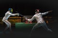 Two man fencing athlete fight on professional sports arena Royalty Free Stock Photo