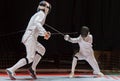 Two man fencing athletes fight Royalty Free Stock Photo