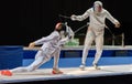 Two man fencing athletes fight Royalty Free Stock Photo
