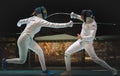 Two man fencing athlete fight on professional sports arena