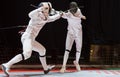 Two man fencing athletes fight Royalty Free Stock Photo