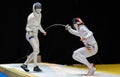 Two man fencing athletes fight Royalty Free Stock Photo