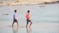 Two Indian young man going for angling in river