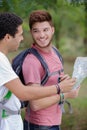 two man hikers looking at map Royalty Free Stock Photo