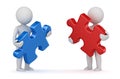 Two man holding red and blue puzzle piece Royalty Free Stock Photo