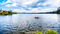 Kayaking on Lac Le Jeune lake near Kamloops, British Columbia, Canada