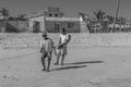 Two man pull a rope to fish at the coastline from Morondava Royalty Free Stock Photo