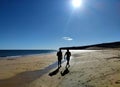 Two man silhouette in sotavento beach. Fuerteventura