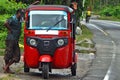 Two man and taxi tuk-tuk in Asia / Thailand / India / Sri Lanka. local transport of Asia, Poverty of Asia, taxi park.