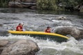 Two man white water kayaking on the river, extreme and fun sport at tourist attraction. Royalty Free Stock Photo