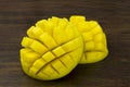 Two mango sliced cube ripe fresh red green yellow vitamins tropical life on wood