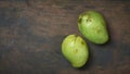 two mangoes on a table top with copy space Royalty Free Stock Photo