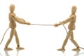 Two manikins pulling a rope Royalty Free Stock Photo