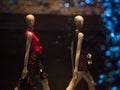 Two mannequins, female dressed in casual clothes. Abstract fashion background concept.