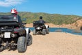 Two mans in protective helmets is driving ATV Royalty Free Stock Photo