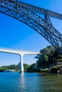 the many bridges of Porto, a modern bridge made ??of concrete and the old iron bridge D. Mary