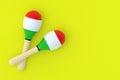 Two maracas on yellow background. Flat lay. Copy space Royalty Free Stock Photo