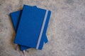 Two of marine blue notebooks Royalty Free Stock Photo