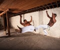 Two Martial Artists in Mid-air Royalty Free Stock Photo