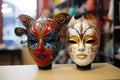 two masks side by side at a masquerade store Royalty Free Stock Photo