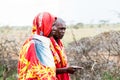 Two Massai men walking together Royalty Free Stock Photo