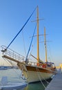 Two-masted sailing ship anchored in the harbor