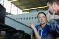 two mechanics working on aircraft Royalty Free Stock Photo