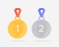 Two medals for the first and second place. Golden medal with red ribbon and silver medal with blue ribbon Royalty Free Stock Photo