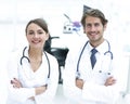 Portrait of two successful professional doctors workers in coats Royalty Free Stock Photo
