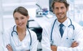 Portrait of two successful professional doctors workers in coats Royalty Free Stock Photo