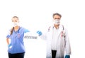 Two medical staff hold a sign during Coronavirus COVID-19 pandemic outbread