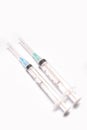 Two medical syringe closeup on white background isolated Royalty Free Stock Photo