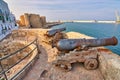 Two Medieval Defense Cannons and Turret In Front Of Castle Carlo V in beautiful Monopoli - Apulia - Puglia - Italy