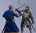 Two medieval knights fighting each other in armor Royalty Free Stock Photo