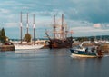 Two medieval spanish galleys and a fishing boat in Honfleur