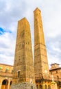 Two medieval towers of Bologna Le Due Torri: Asinelli tower and Garisenda tower on Piazza di Porta Ravegnana Royalty Free Stock Photo