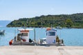 Two Mediterranean small fishing boats moored at wharf Royalty Free Stock Photo