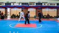 Two men athletes competes during the `Sukan Kombat 6 Penjuru` competition or fighting combat games.