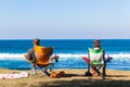 Two Men Beach Chairs Ocean Royalty Free Stock Photo