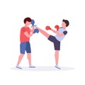 Two men boxers exercising thai boxing in red gloves couple fighters practicing at the fight club healthy lifestyle