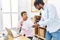 Two men business workers discussing working at office Royalty Free Stock Photo