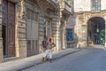 Two men chat on the streets of Havana Cuba